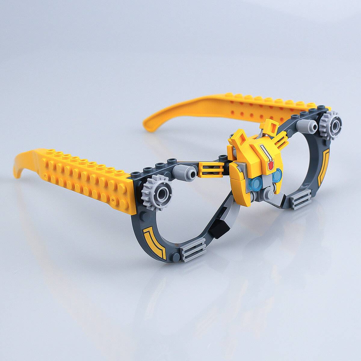Fully assembled robot-style Kids DIY Glasses Building Block Set with yellow and gray frames and mechanical details. Fun and educational toy for kids.