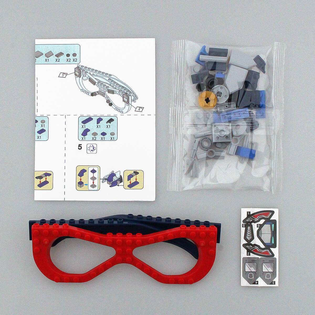 Instruction manual and building pieces for the mechanical-themed Kids DIY Glasses Building Block Set. Easy-to-follow guide for creative assembly.