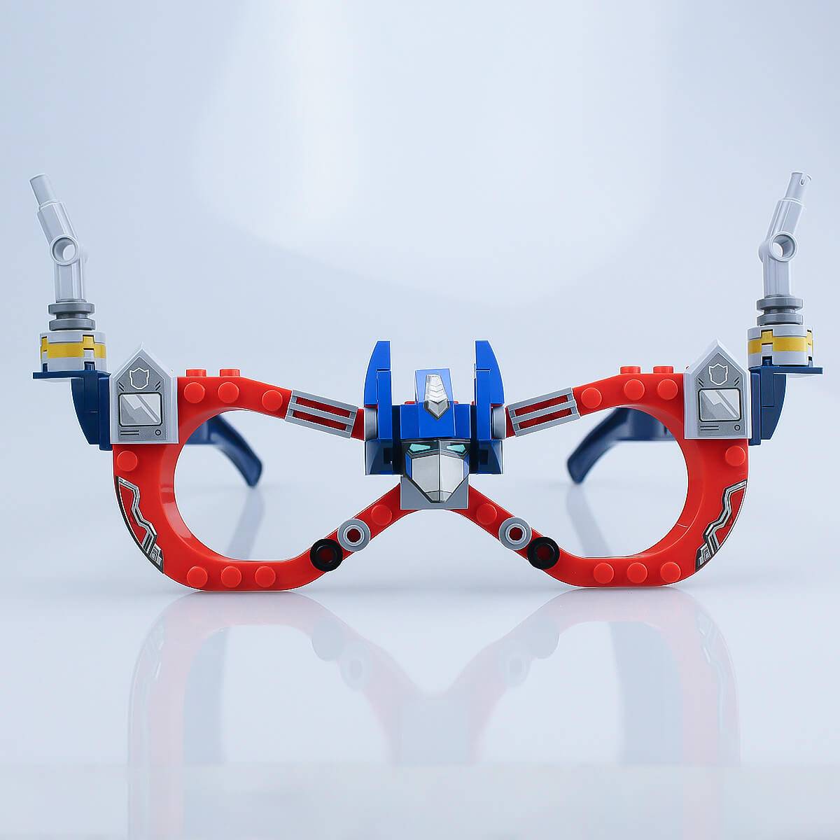 Fully assembled mechanical-themed Kids DIY Glasses Building Block Set with red and blue frames and robot-inspired details. Fun and educational toy for kids.
