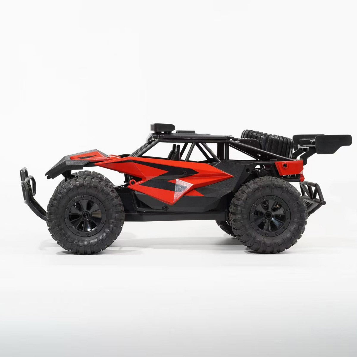 Side view of WBRC 1809 1:14 Off Road RC Monster Truck showcasing durable suspension and aggressive tire tread for tough terrains | HugmieToys