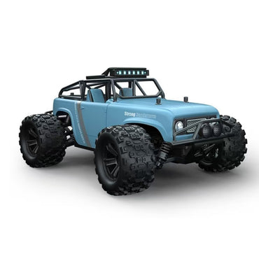 Blue WBRC 1813 1:18 Scale 4WD RC Monster Truck with rugged tires and LED roof lights, built for high-speed remote control performance.