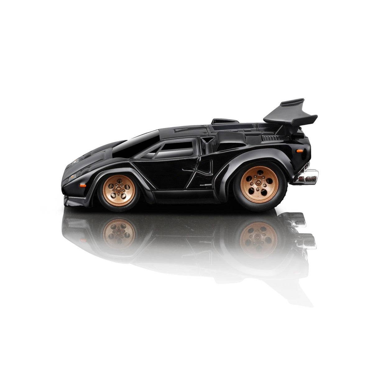 Side view of the Maisto Muscle Machines Lamborghini Countach diecast model, showcasing its scissor doors and gold wheels.