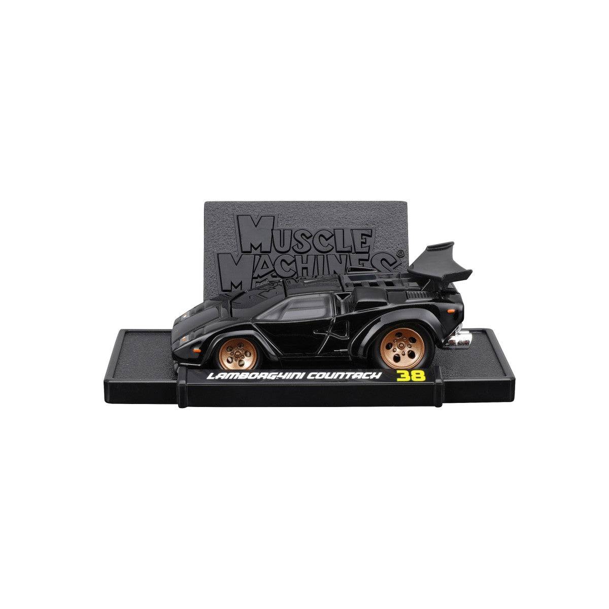 Lamborghini Countach diecast model on a display stand, showcasing its aggressive stance, large rear wing, and detailed bodywork.
