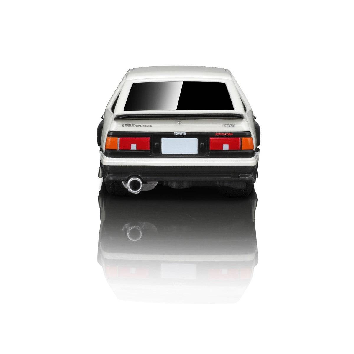 Rear view of the Maisto Muscle Machines 1983 Toyota Sprinter Trueno AE86 diecast model, featuring classic taillights and a detailed exhaust system.