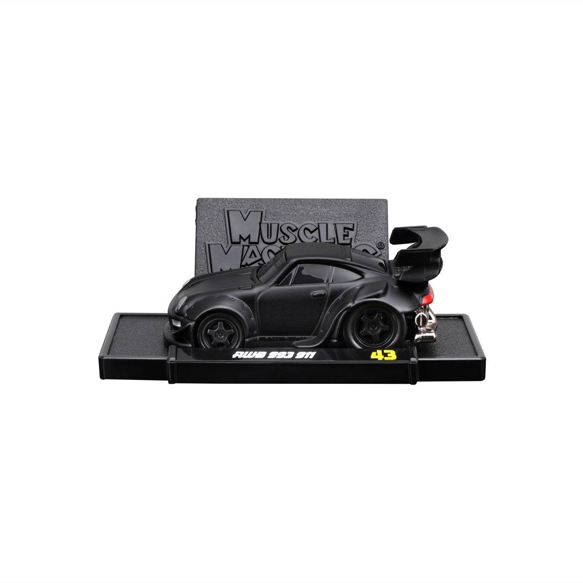 RWB Porsche 993 diecast model on a display stand, showcasing its aggressive stance, large rear wing, and detailed bodywork.
