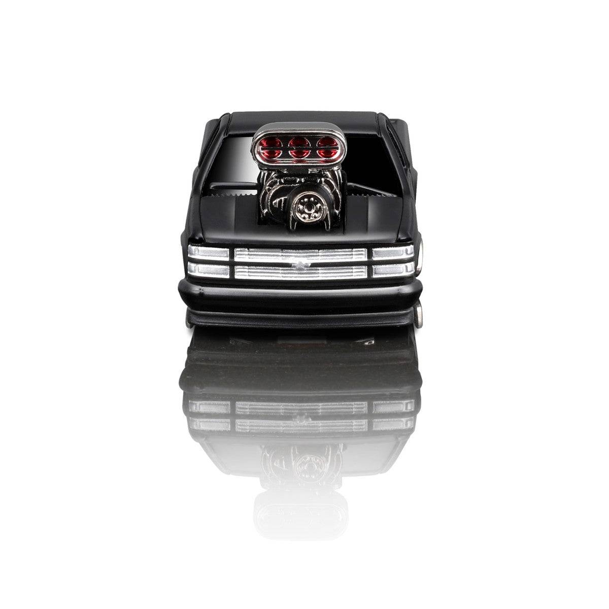 Front view of the Maisto Muscle Machines 1993 Chevrolet 454 SS Pickup diecast model, highlighting its oversized engine and bold grille.