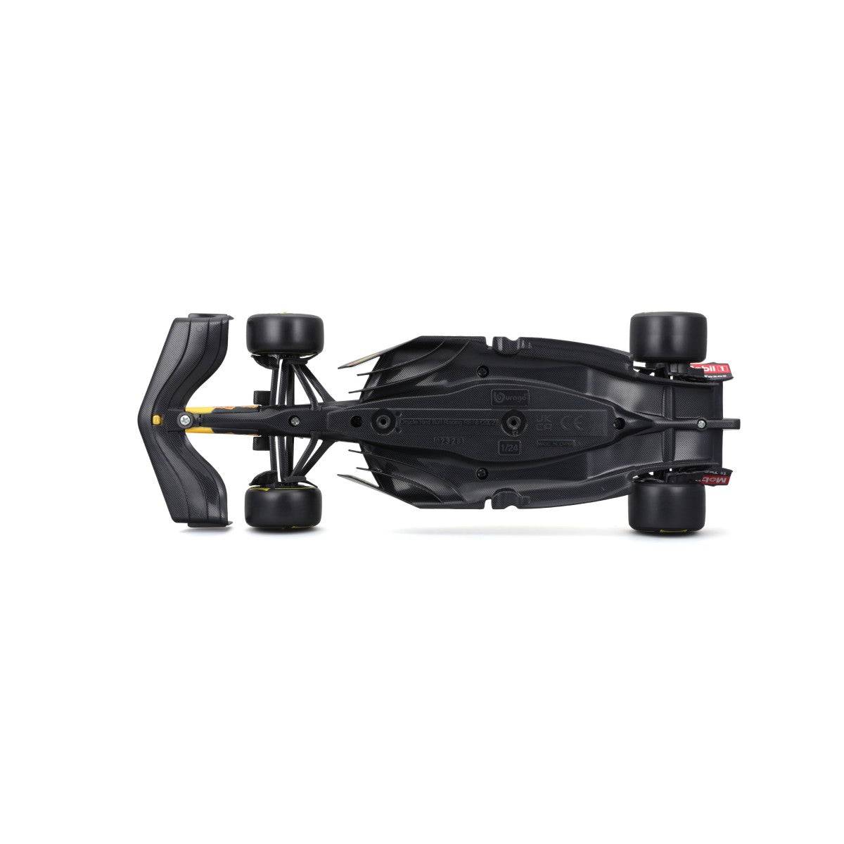 Underside view of Bburago 1:24 F1 Car Model Red Bull Racing RB18 #1 Verstappen, highlighting chassis details and aerodynamic elements.