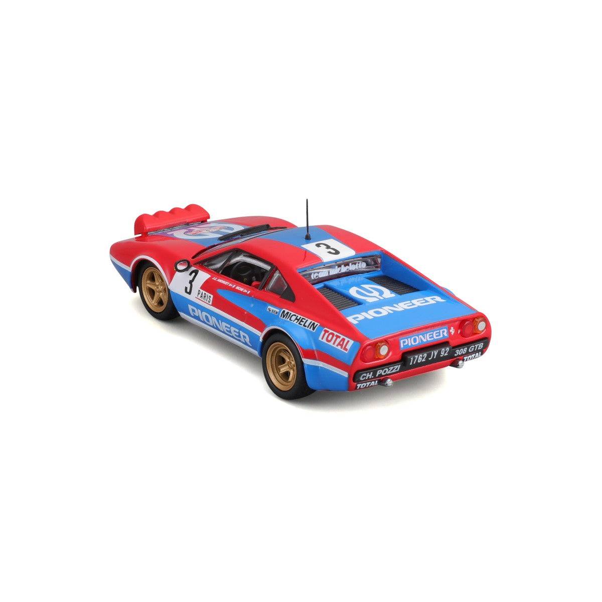 Rear three-quarter view of Bburago 1:43 Ferrari 308 GTB 1982 model car highlighting taillights, sponsor logos, and aerodynamic design.