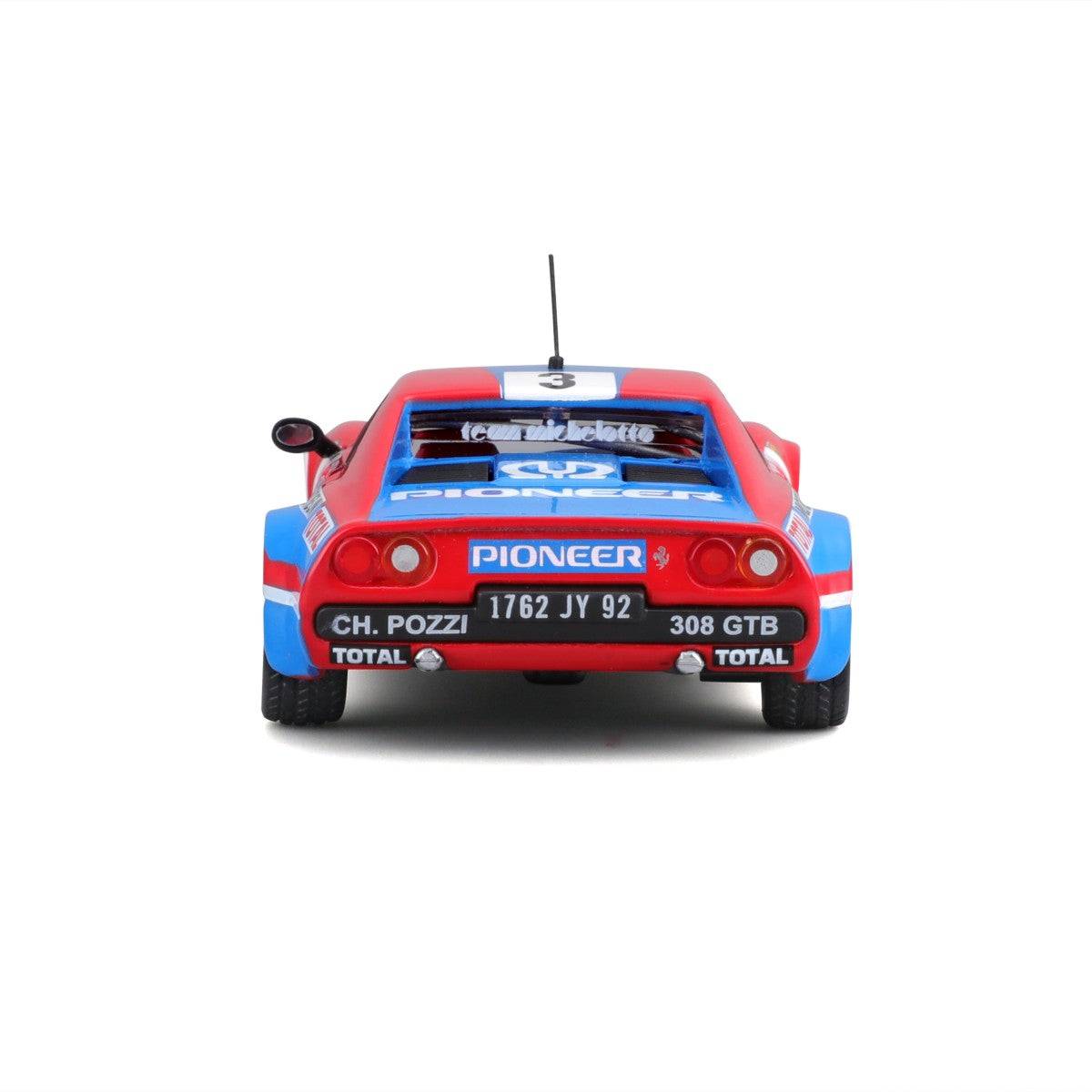 Rear view of Bburago 1:43 Ferrari 308 GTB 1982 model car with Pioneer and Total branding, showcasing taillights and exhaust details.