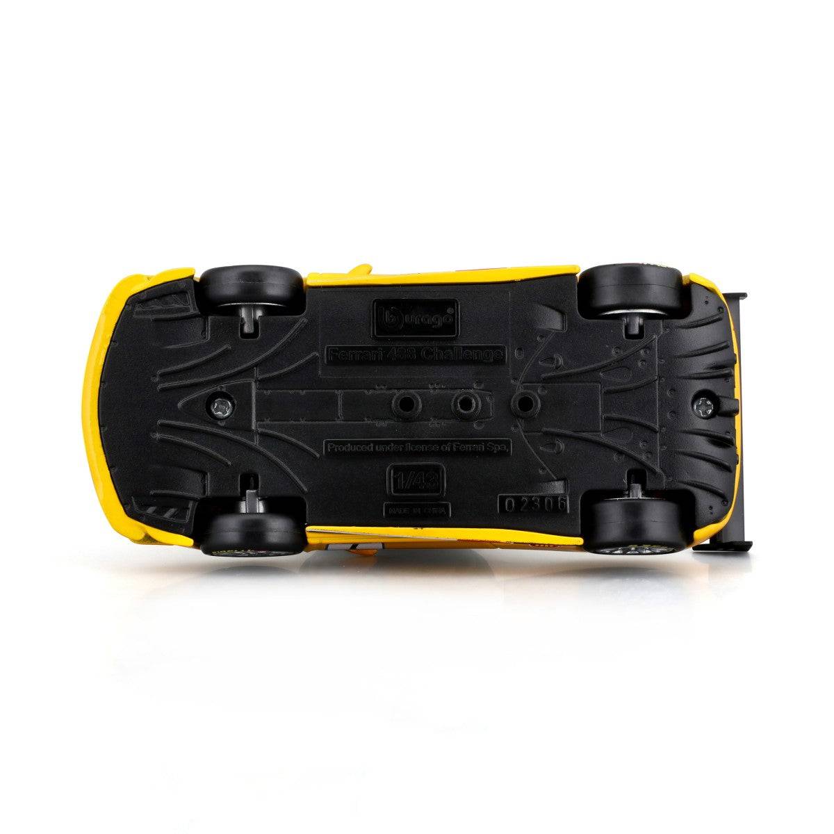 Underside of Bburago 1:43 Ferrari 488 Challenge 2017 alloy model car, displaying detailed chassis, manufacturer branding, and realistic underbody design.