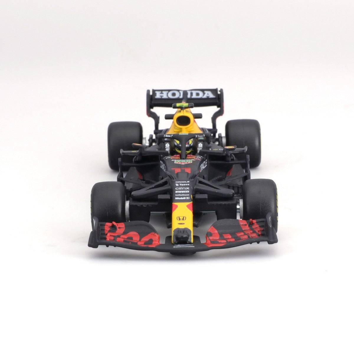 Front view of the Bburago 1:43 F1 Red Bull Racing RB16B #11 Sergio Perez model, emphasizing the aggressive aerodynamics and front wing details.