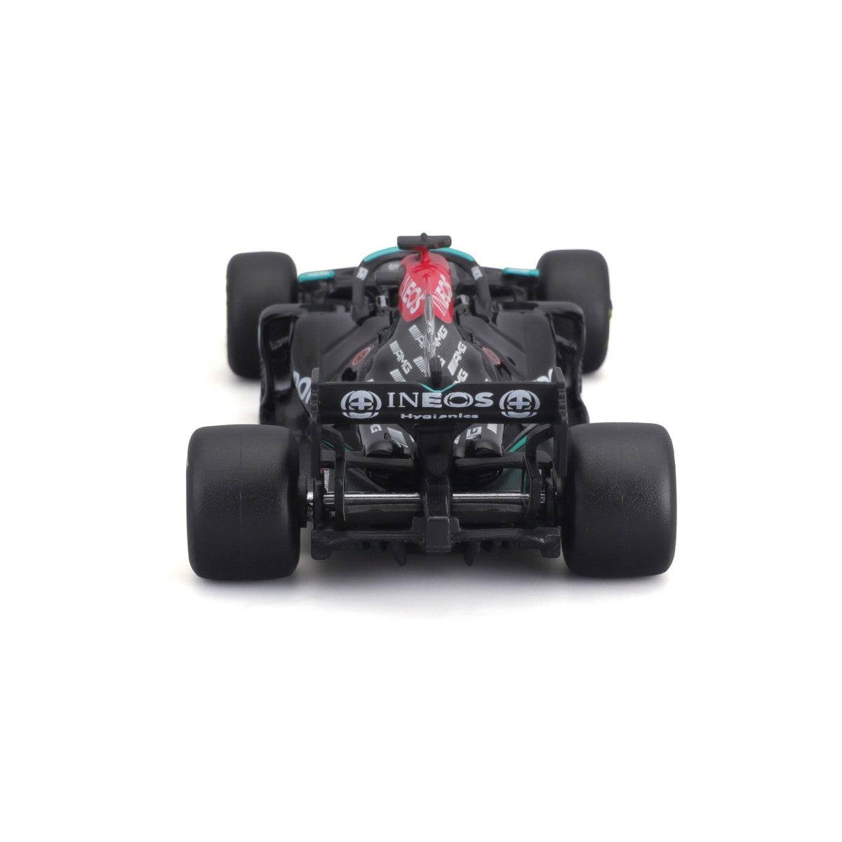 Rear view of Bburago 1:43 F1 Mercedes-AMG W12 E Performance #77 Valtteri Bottas, showcasing rear wing, exhaust, and tire design.