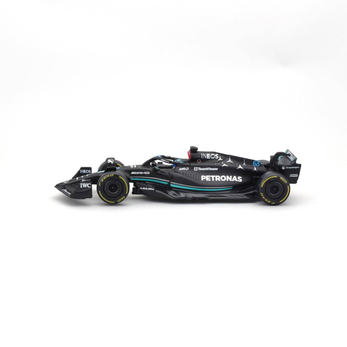 Left-side profile of Bburago 1:43 F1 Mercedes-AMG Petronas W14 #63 George Russell, featuring Petronas branding and sleek bodywork.