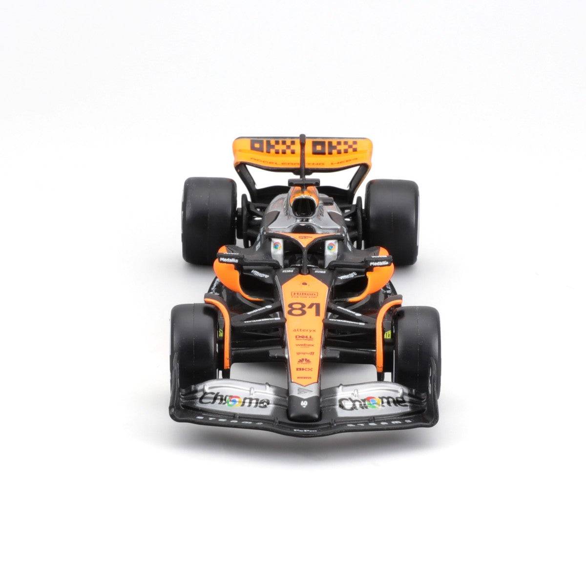 Front view of the Bburago 1:43 F1 Car Model 2023 McLaren MCL60 #81 Oscar Piastri. Features authentic details and sponsor logos.