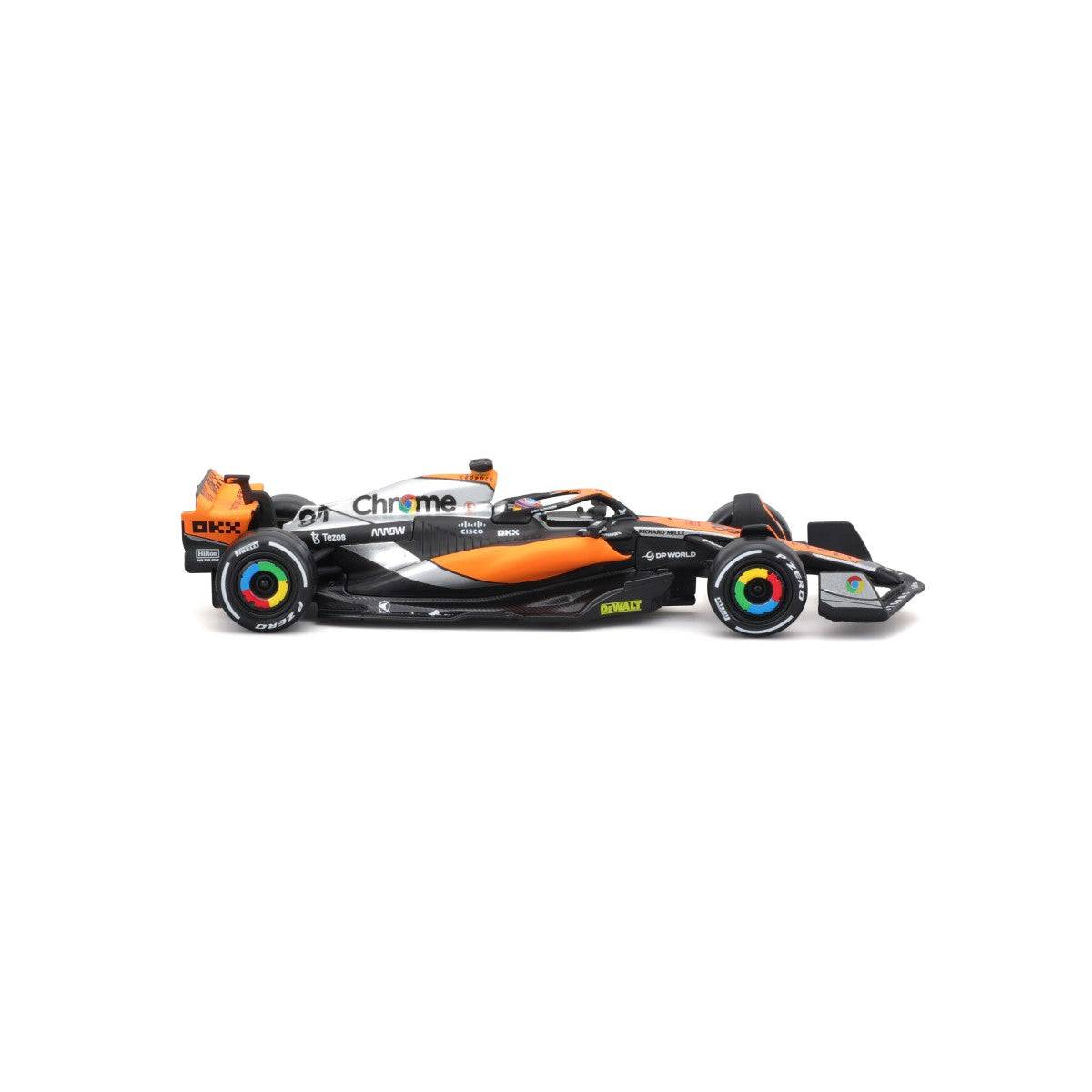 Side profile of the Bburago 1:43 F1 Car Model 2023 McLaren MCL60 #81 Oscar Piastri. Captures the sleek and aerodynamic design of the real car.