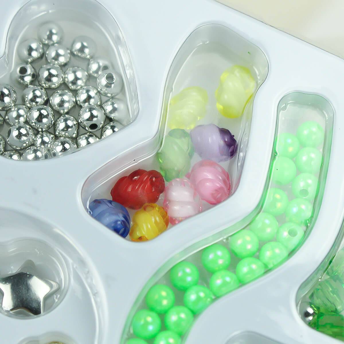 Kids DIY bead set featuring colorful plastic and metallic beads in various shapes, perfect for creative jewelry-making projects.