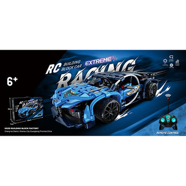 K&T 1:16 Remote Control Building Block Car in blue with sporty decals, includes 27 MHz remote control and rechargeable battery. Perfect for racing fans.
