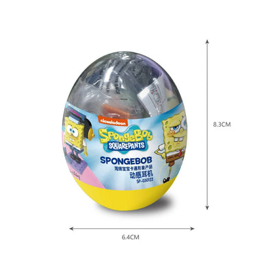Close-up of a SpongeBob SquarePants Capsule Toy Music Party SP-030402, showcasing the packaging with dimensions of 8.3cm height and 6.4cm width. Includes a surprise building toy inside.