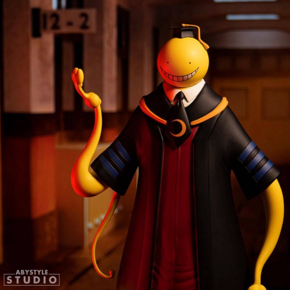 ABYstyle Studio Koro Sensei action figure posed in a dimly lit school hallway, capturing his mysterious and playful personality from Assassination Classroom.
