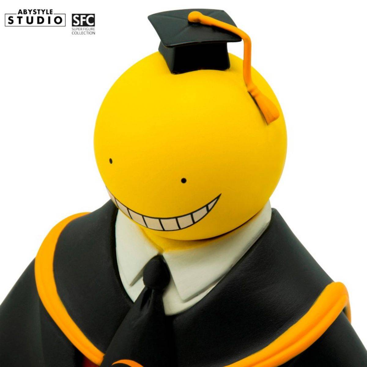 Close-up of Koro Sensei's face, featuring his signature wide grin and graduation cap, part of the ABYstyle Studio Assassination Classroom figure collection.