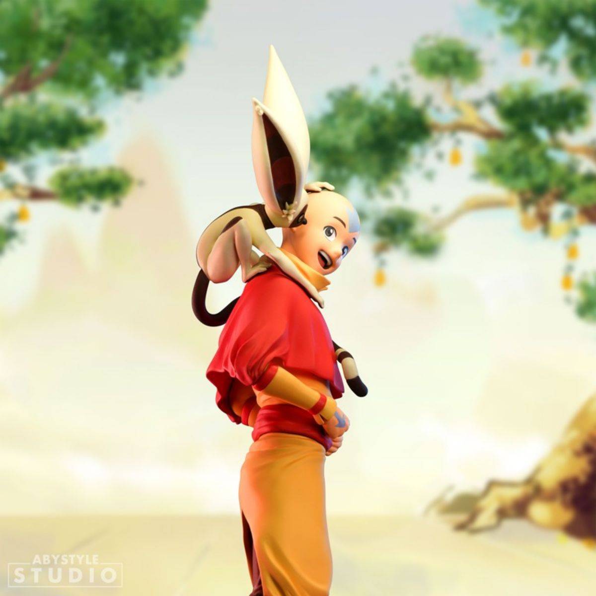 Side view of ABYstyle Studio Avatar The Last Airbender Aang SFC Figure, showing intricate sculpting and vibrant colors of Aang and Momo.