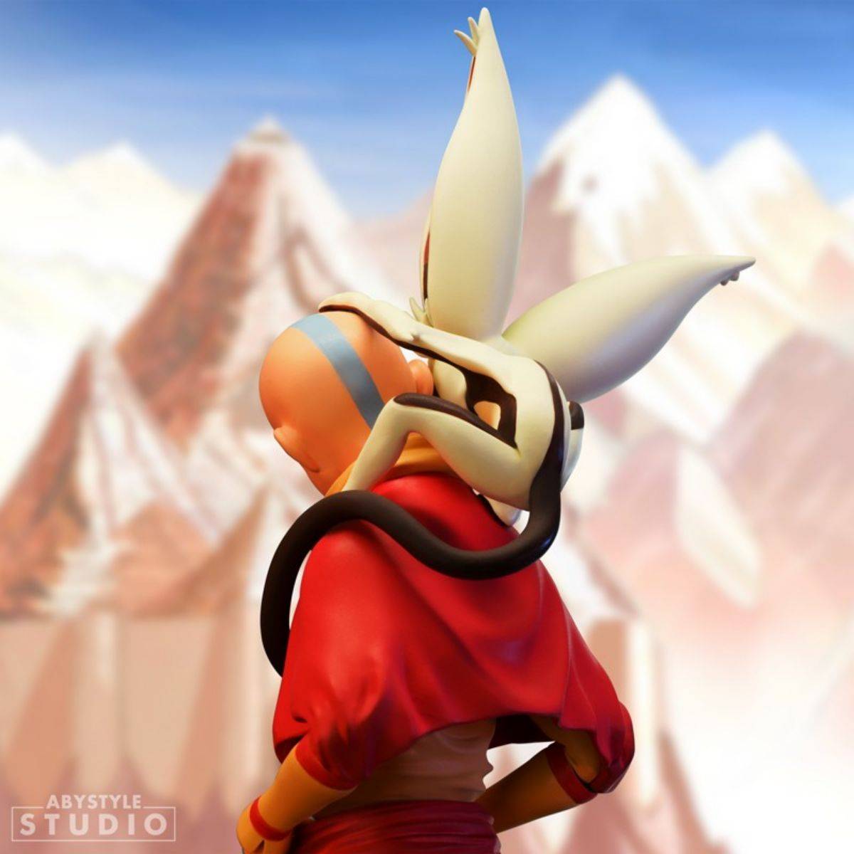 Rear view of ABYstyle Studio Avatar The Last Airbender Aang SFC Figure, displaying Momo’s wings and Aang’s signature outfit details.