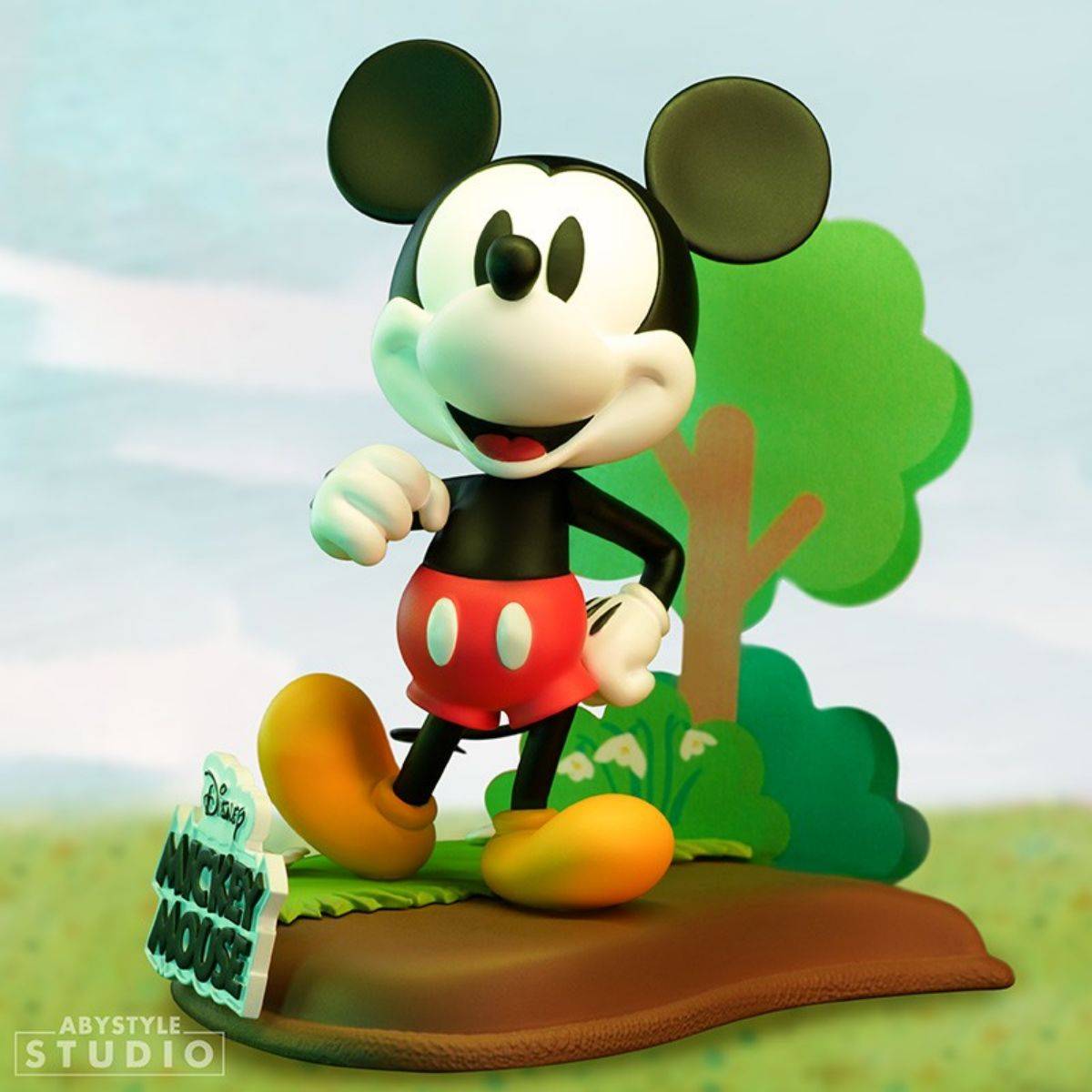 ABYstyle Studio Mickey Mouse action figure, showcasing the beloved Disney character in a cheerful pose with a scenic background.