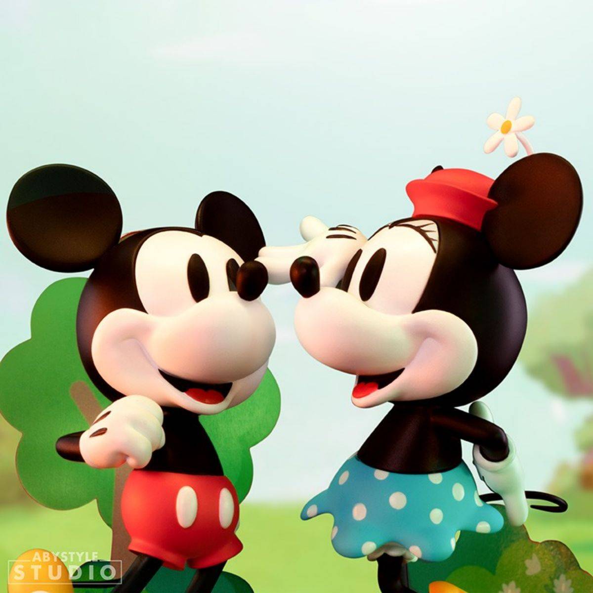 Mickey and Minnie Mouse figures by ABYstyle Studio, posed in a romantic scene, perfect for Disney collectors and fans.