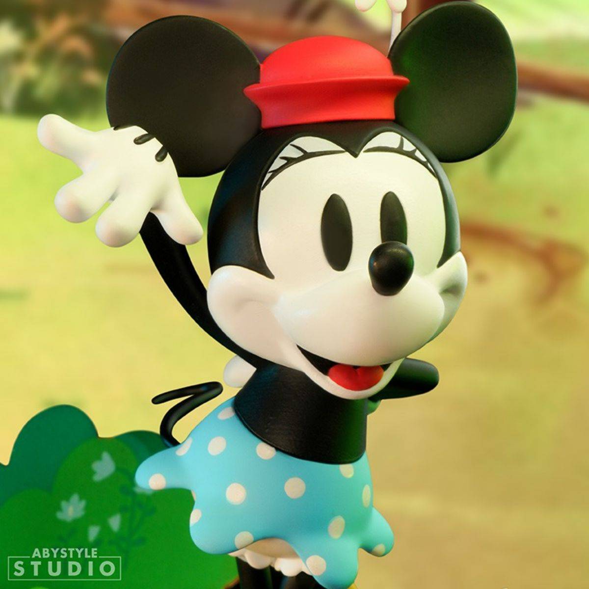Detailed view of Disney Minnie Mouse figure by ABYstyle Studio, highlighting her expressive pose and classic Steamboat Willie outfit.