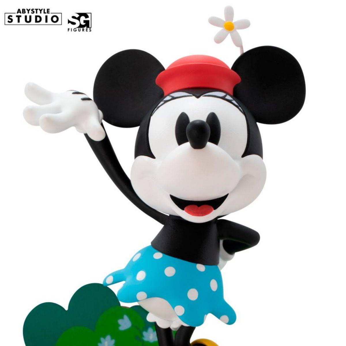 Detailed shot of Disney Minnie Mouse figure by ABYstyle Studio, featuring her classic Steamboat Willie design with a red hat and blue skirt.