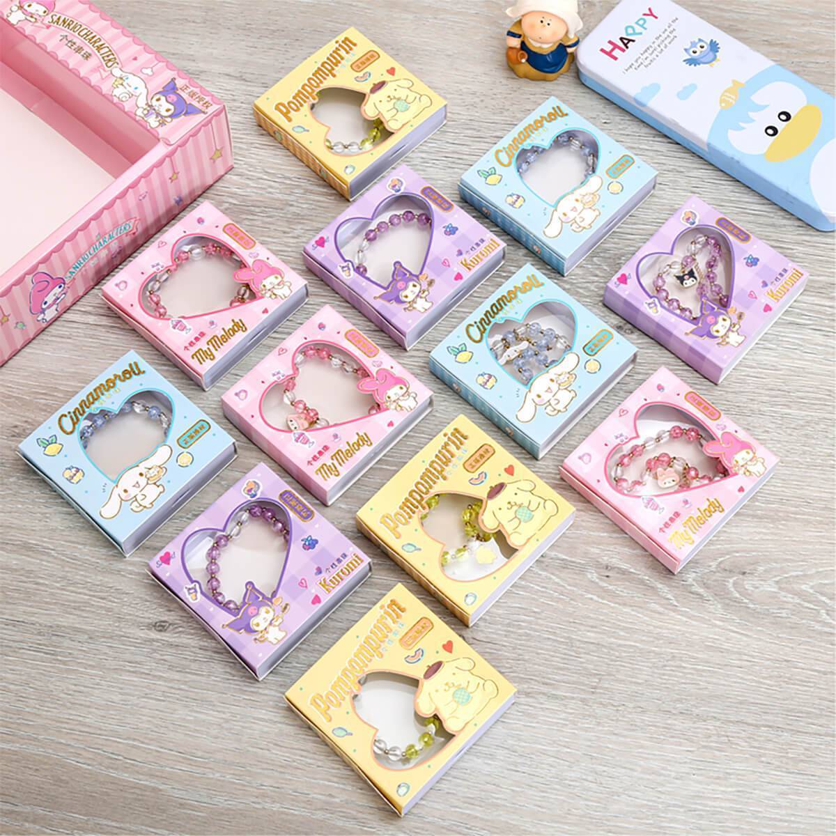 Assorted Sanrio Cute Anime Crystal Bracelets in colorful packaging, each featuring beloved Sanrio characters like Cinnamoroll and Pompompurin.