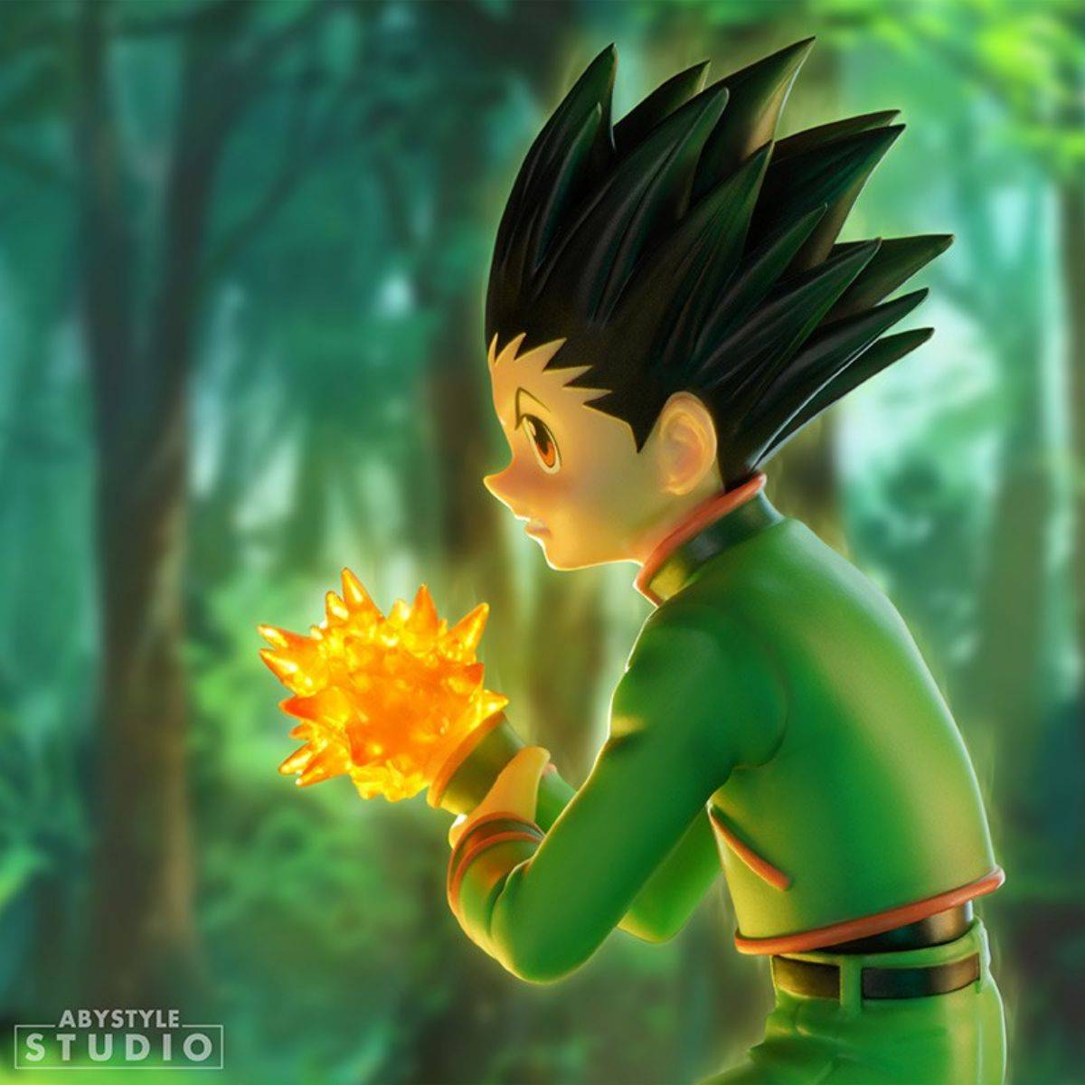 Side view of ABYstyle Studio Hunter x Hunter Gon SFC Figure 15cm. Features Gon’s focused expression and glowing Jajanken attack in a forest setting.