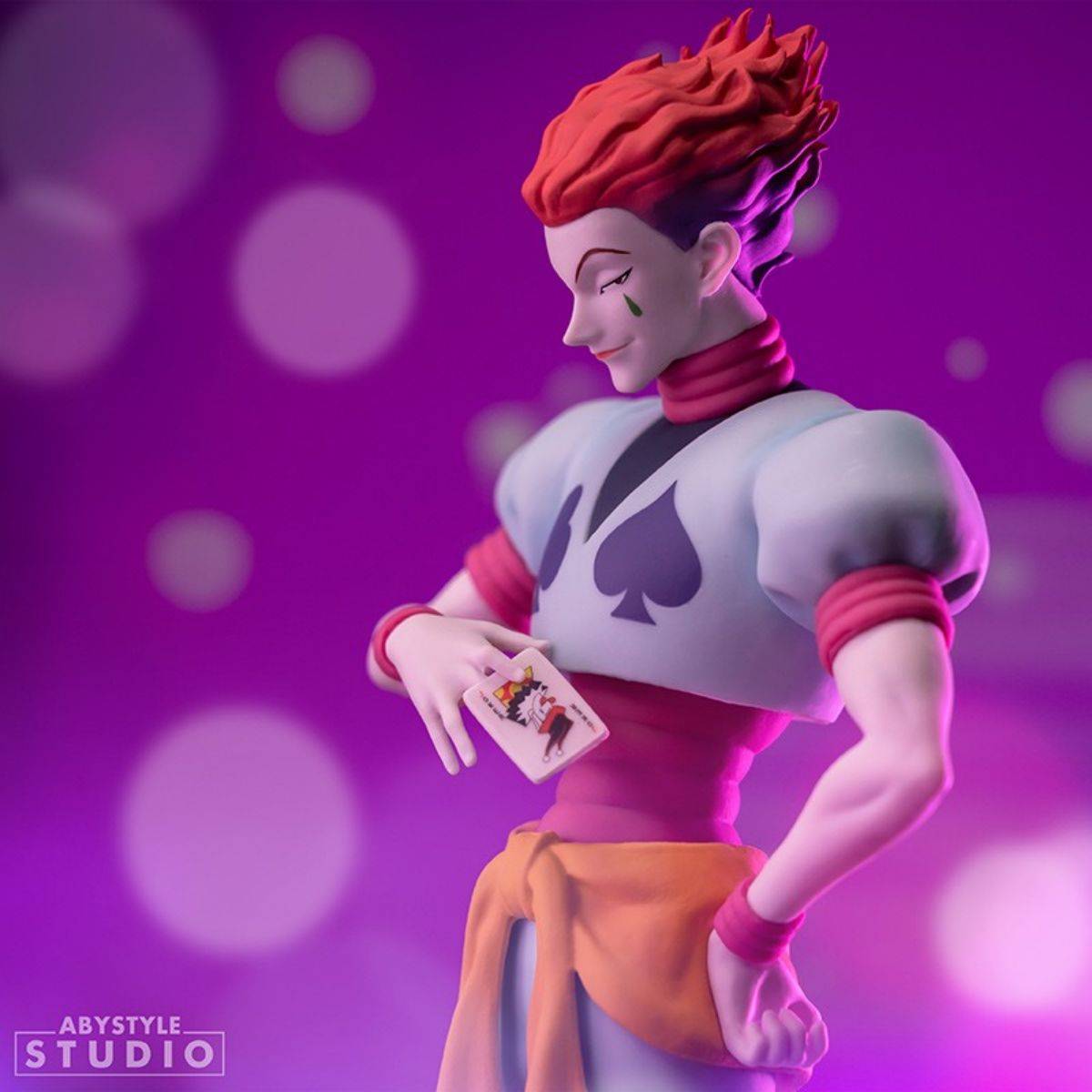 Side profile of ABYstyle Studio Hunter x Hunter Hisoka SFC Figure 20cm, emphasizing his intricate design and playing card detail.