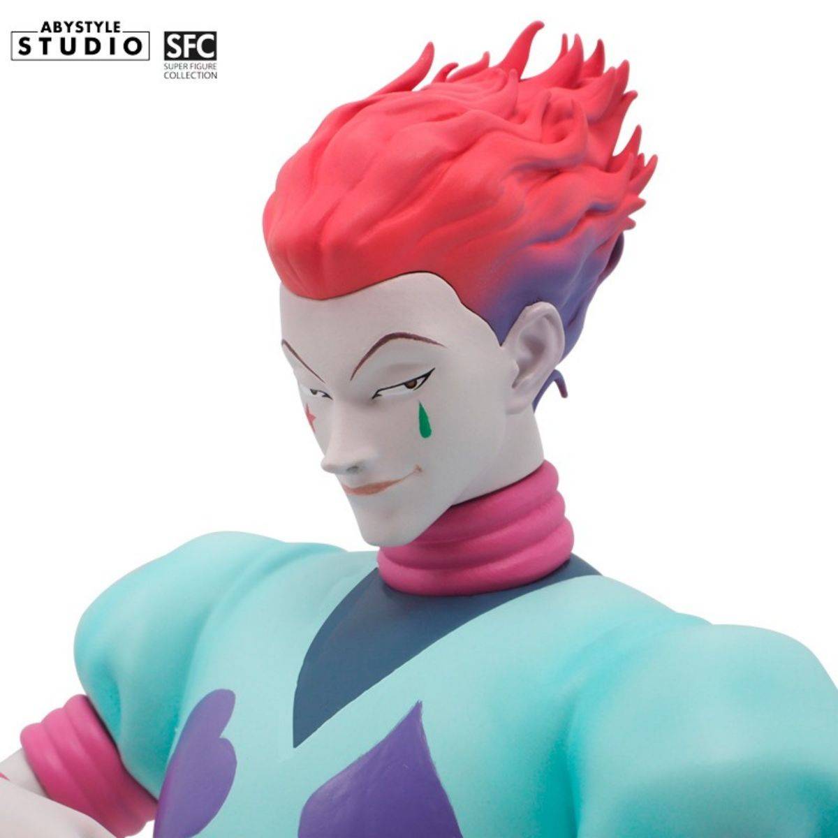Close-up of Hisoka's face from the ABYstyle Studio Hunter x Hunter SFC Figure 20cm, highlighting his red hair and signature teardrop tattoo.