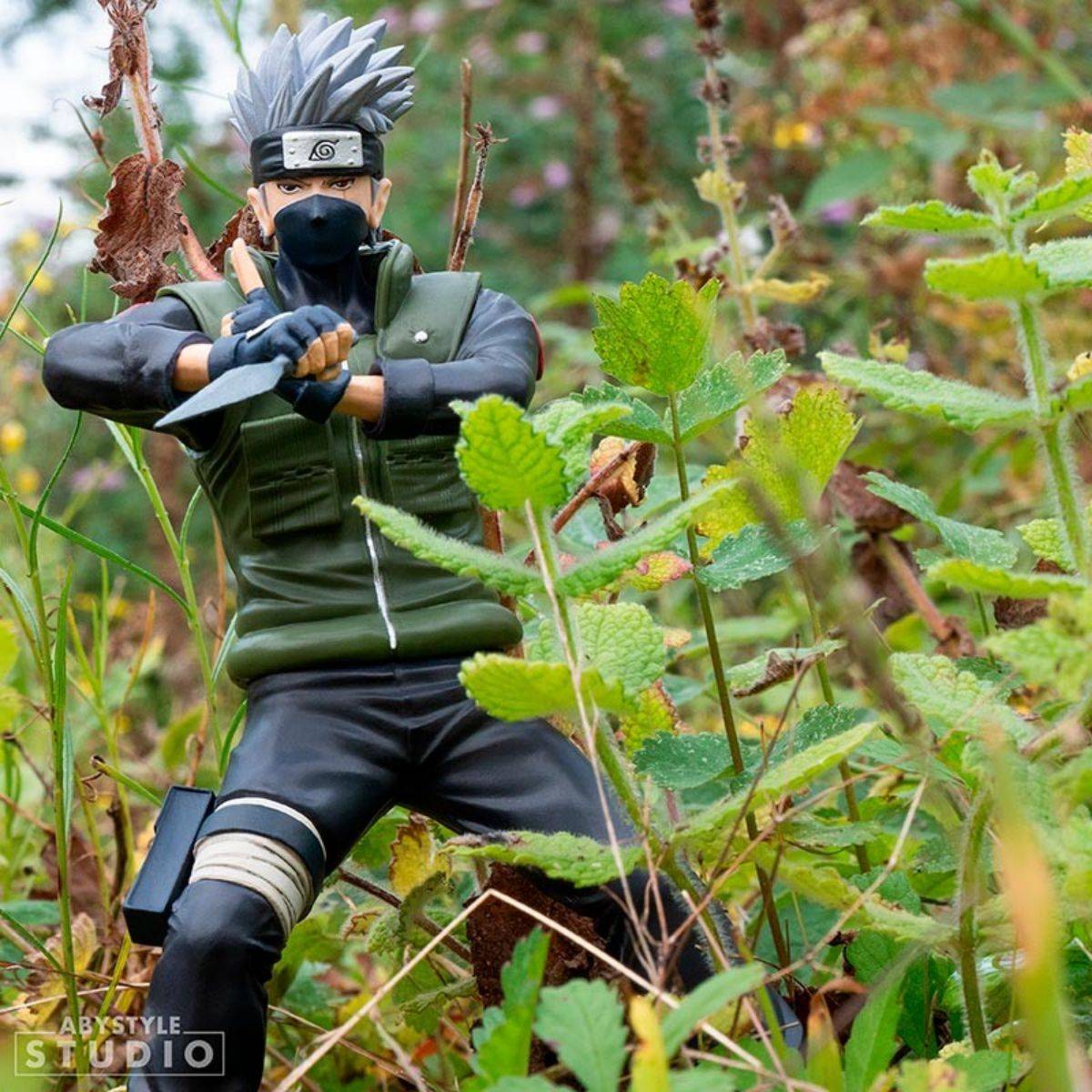 ABYstyle Studio Naruto Shippuden Kakashi SFC Figure 16.5cm posed in an outdoor setting, emphasizing its realistic detailing and ninja stance.