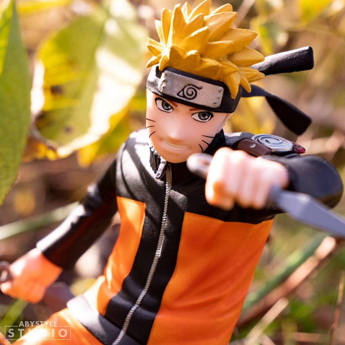 ABYstyle Studio Naruto Shippuden Naruto SFC Figure 17cm posed outdoors with natural lighting, highlighting intricate sculpting and vibrant colors.