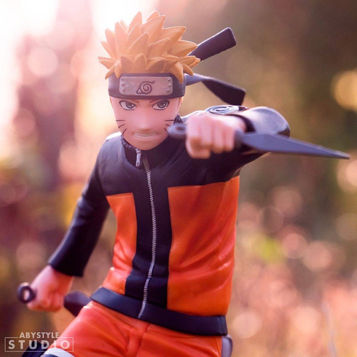 ABYstyle Studio Naruto Shippuden Naruto SFC Figure 17cm captured in warm sunlight, emphasizing the detailed craftsmanship and anime-accurate design.
