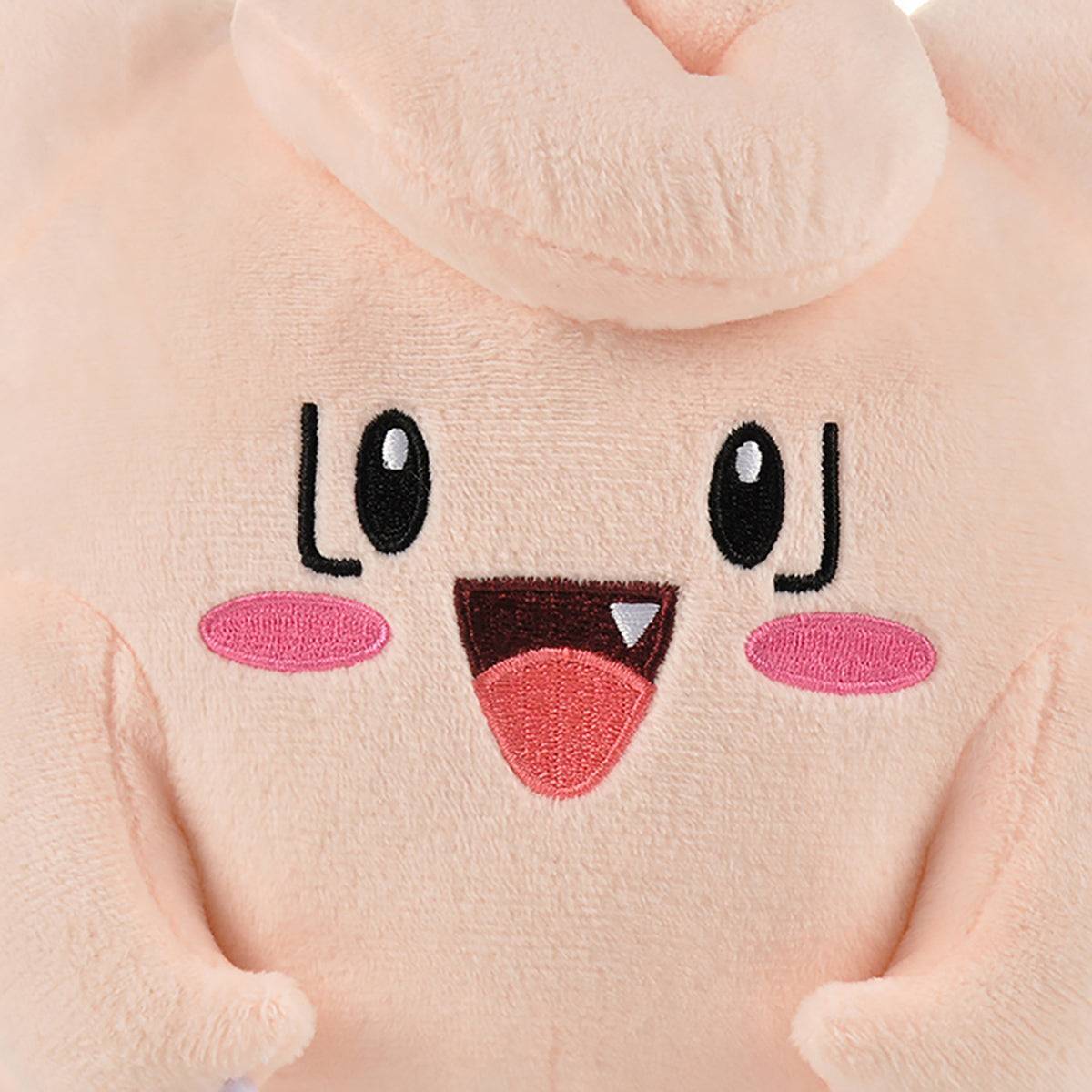 Close-up of Pokemon Clefairy Plush Toy 20.5cm's embroidered face, featuring bright eyes and a cheerful smile. High-quality plush for Pokemon enthusiasts.