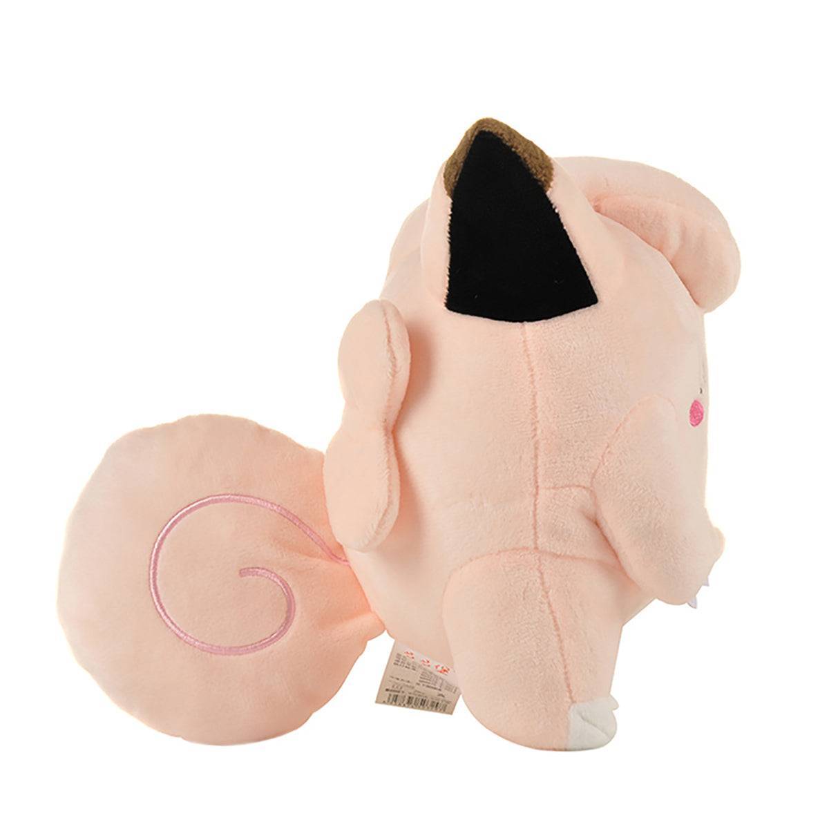 Side profile of Pokemon Clefairy Plush Toy 20.5cm with its signature curled tail and embroidered facial features. A charming addition to any collection.