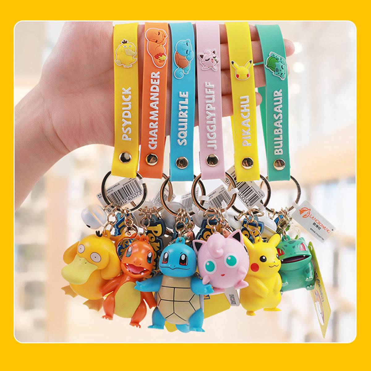 Collection of Pokemon figure keychains featuring Pikachu, Psyduck, Charmander, Squirtle, Jigglypuff, and Bulbasaur. A must-have for fans.