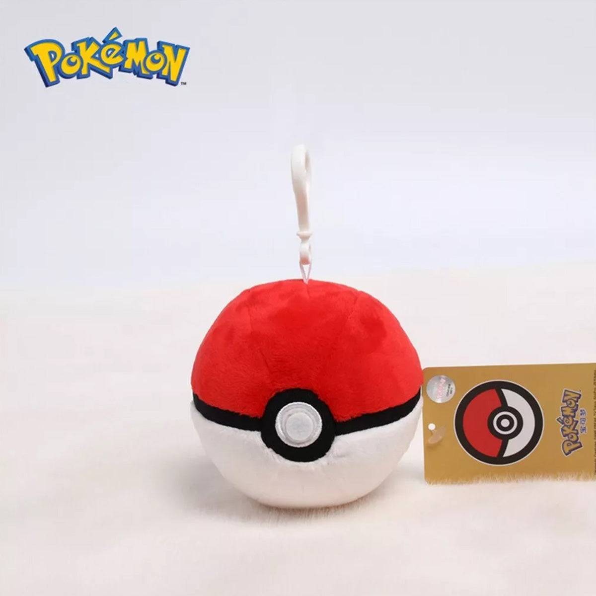 Pokemon Plush Pokeball Keychain (10cm) with an attached gold Pokémon tag. A cute and soft accessory for Pokémon trainers on the go.