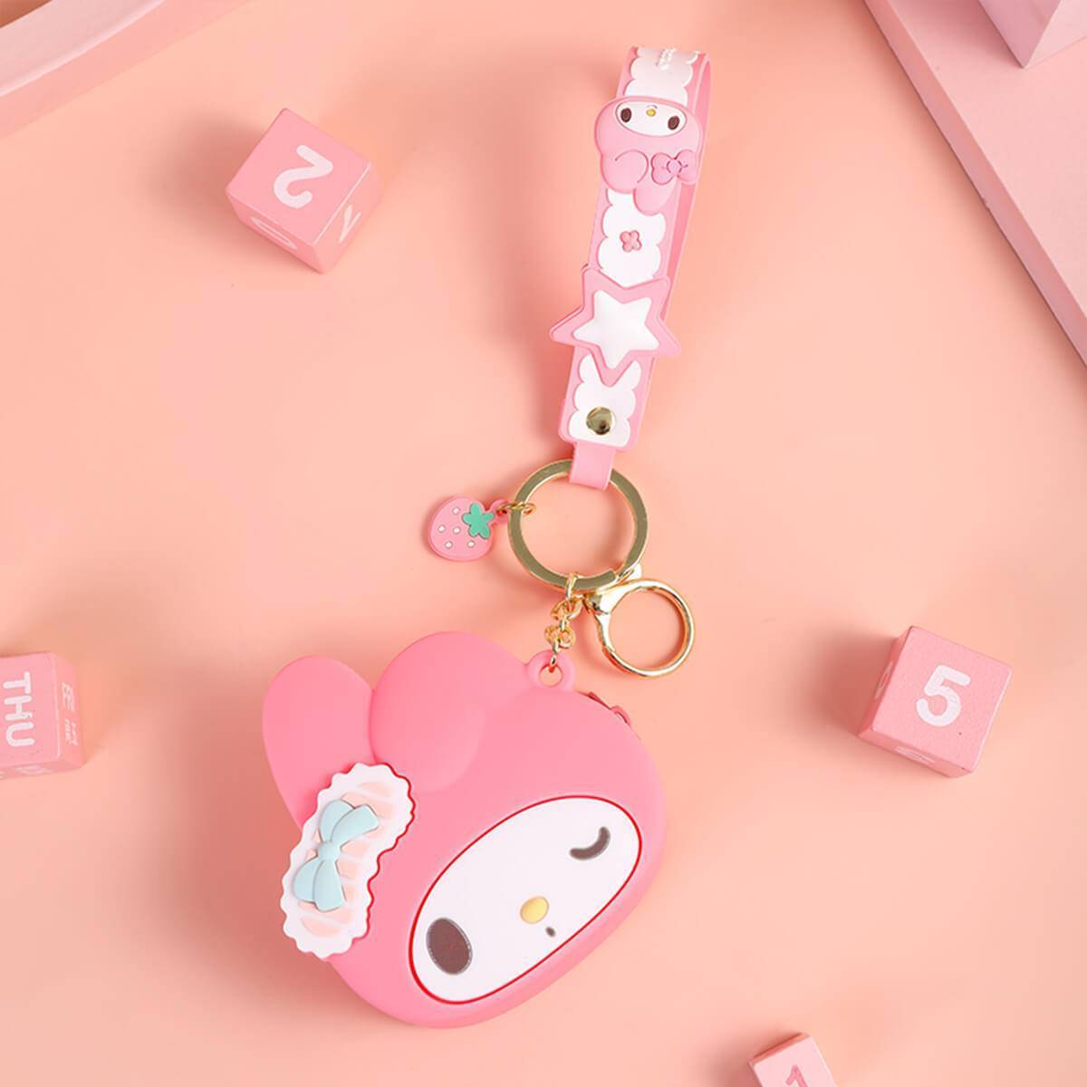 Dark pink My Melody Sanrio Cartoon Silicone Coin Purse Keychain with a matching strap and keyring. Adorable and practical for everyday use.