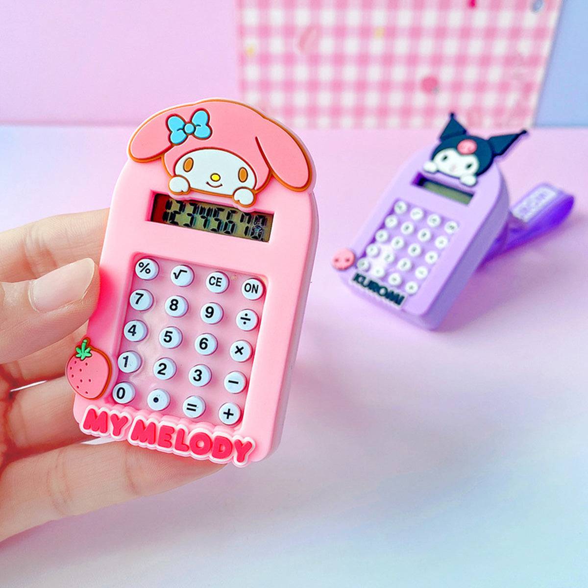 Close-up of My Melody and Kuromi Sanrio Characters Cute Cartoon Calculator Keychains with functional mini calculators.