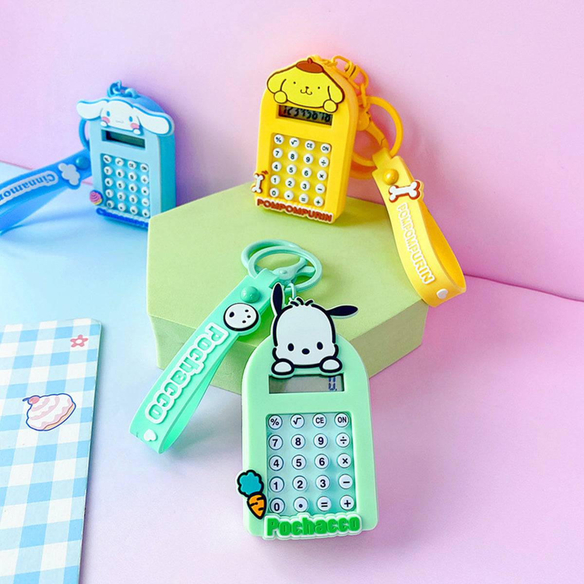 Pochacco, Pompompurin, and Cinnamoroll Sanrio Characters Cute Cartoon Calculator Keychains with vibrant colors and keyrings.