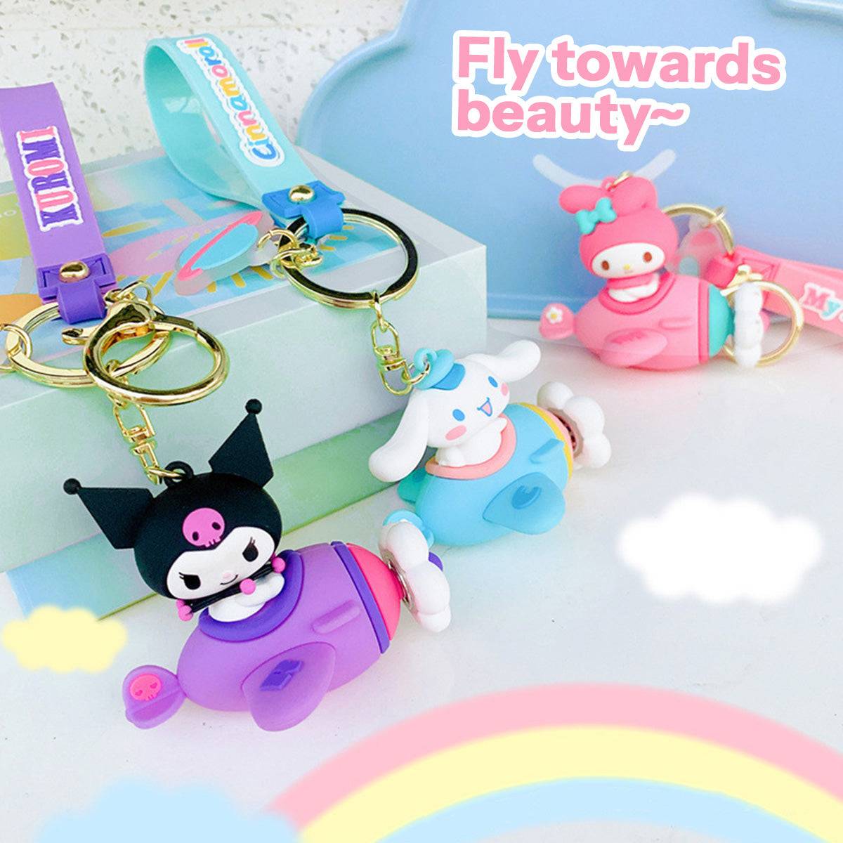Sanrio Airplane Keychains featuring Kuromi, Cinnamoroll, and My Melody in vibrant colors. A perfect addition to any Sanrio collection.