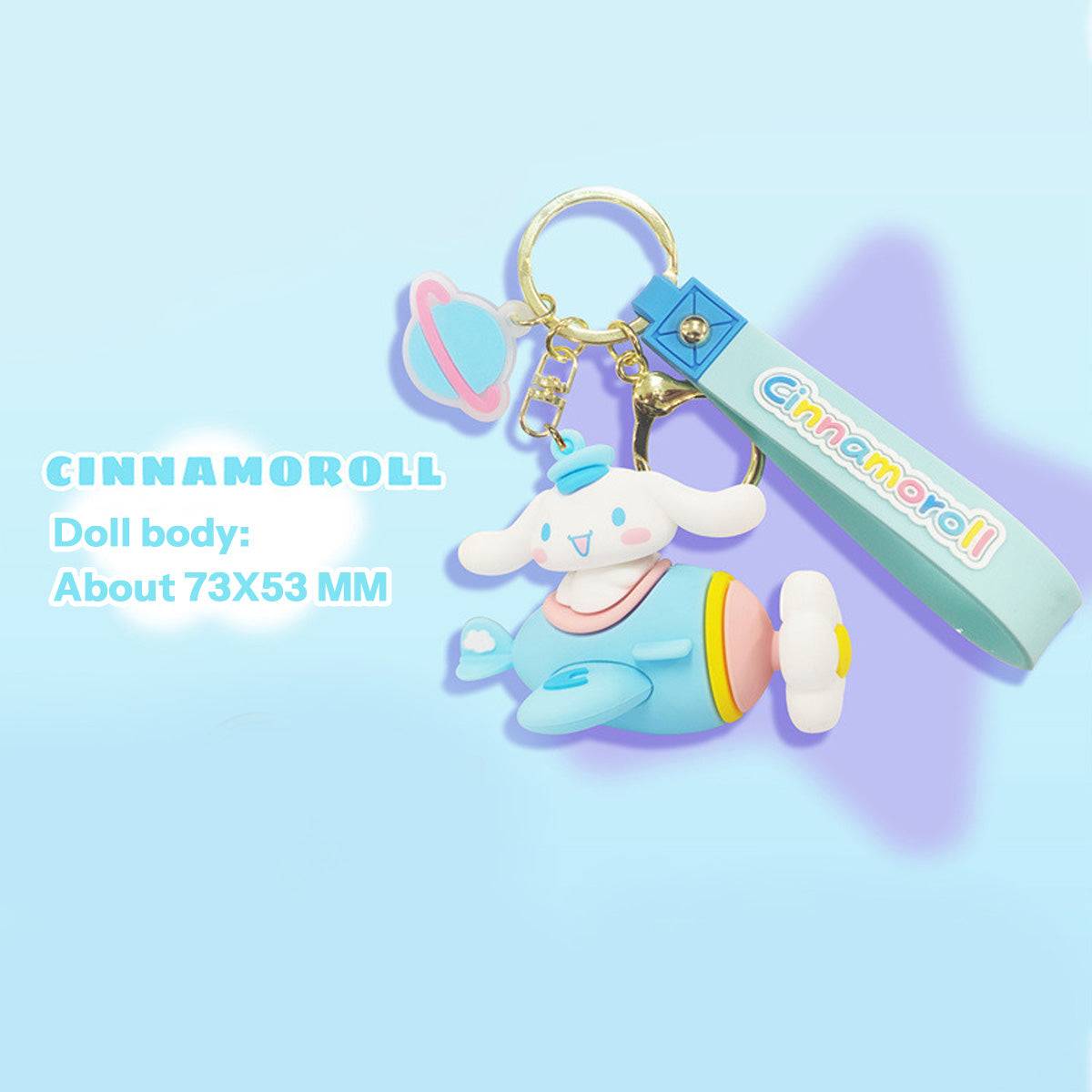Cinnamoroll Airplane Keychain with a pastel blue and pink design, featuring a wrist strap and keyring. A must-have for Sanrio collectors.