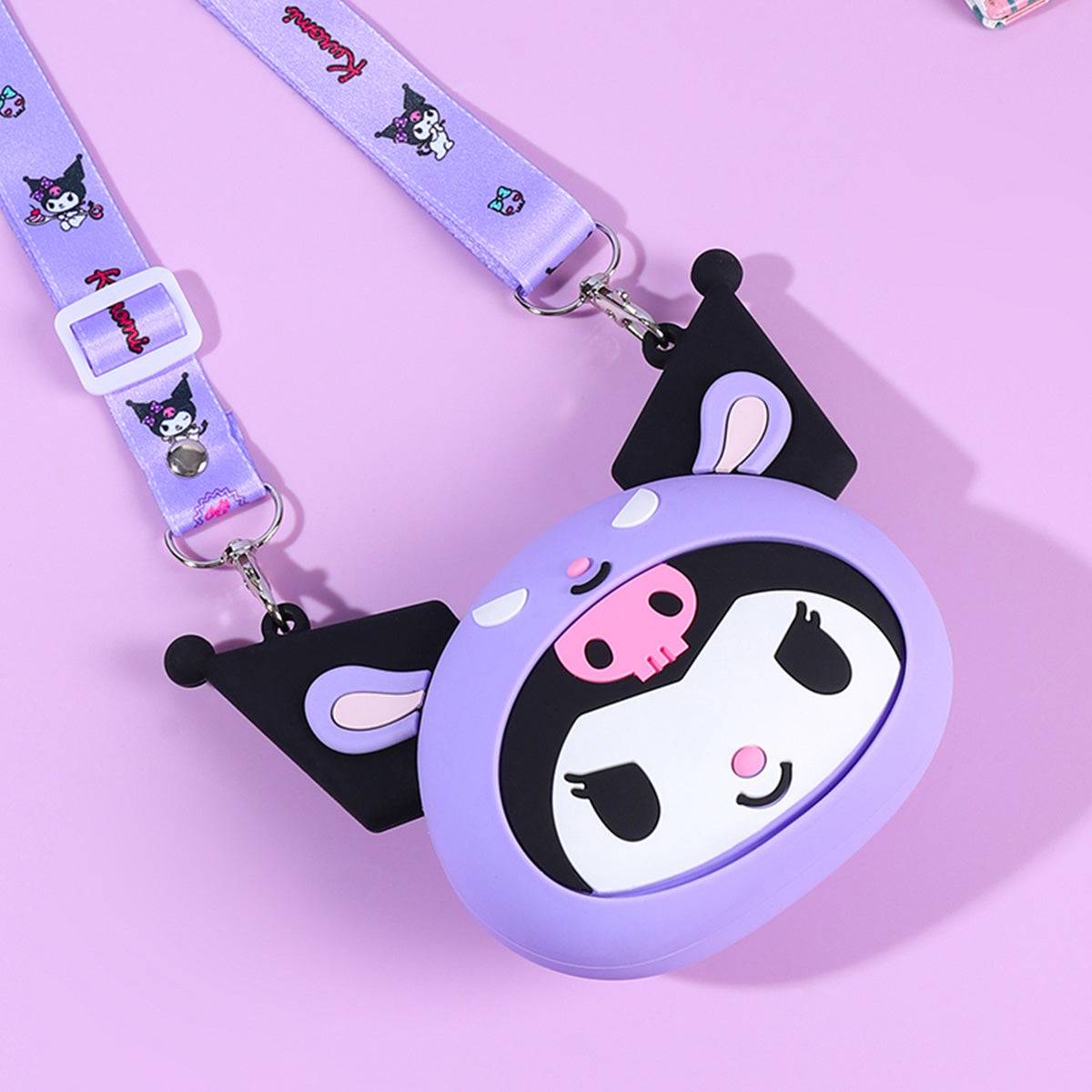 Close-up of the Kuromi Sanrio Characters Mini Silicone Crossbody Bag with a detailed purple strap. A stylish and practical accessory.