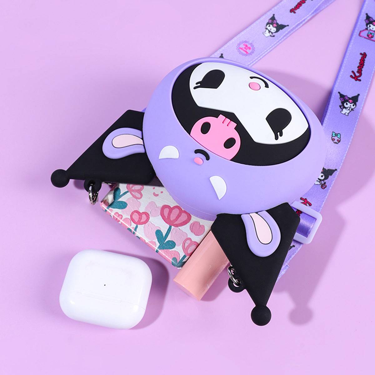 Sanrio Characters Mini Silicone Crossbody Bag showcasing its storage capacity with a Kuromi design. Ideal for carrying small essentials.