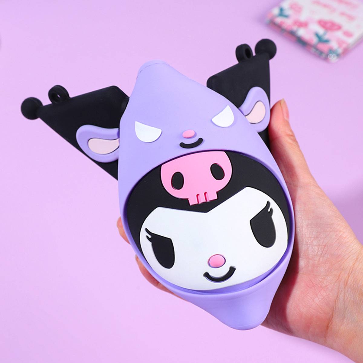 Flexible and squeezable Kuromi Sanrio Characters Mini Silicone Crossbody Bag. Made from soft, durable silicone for everyday use.