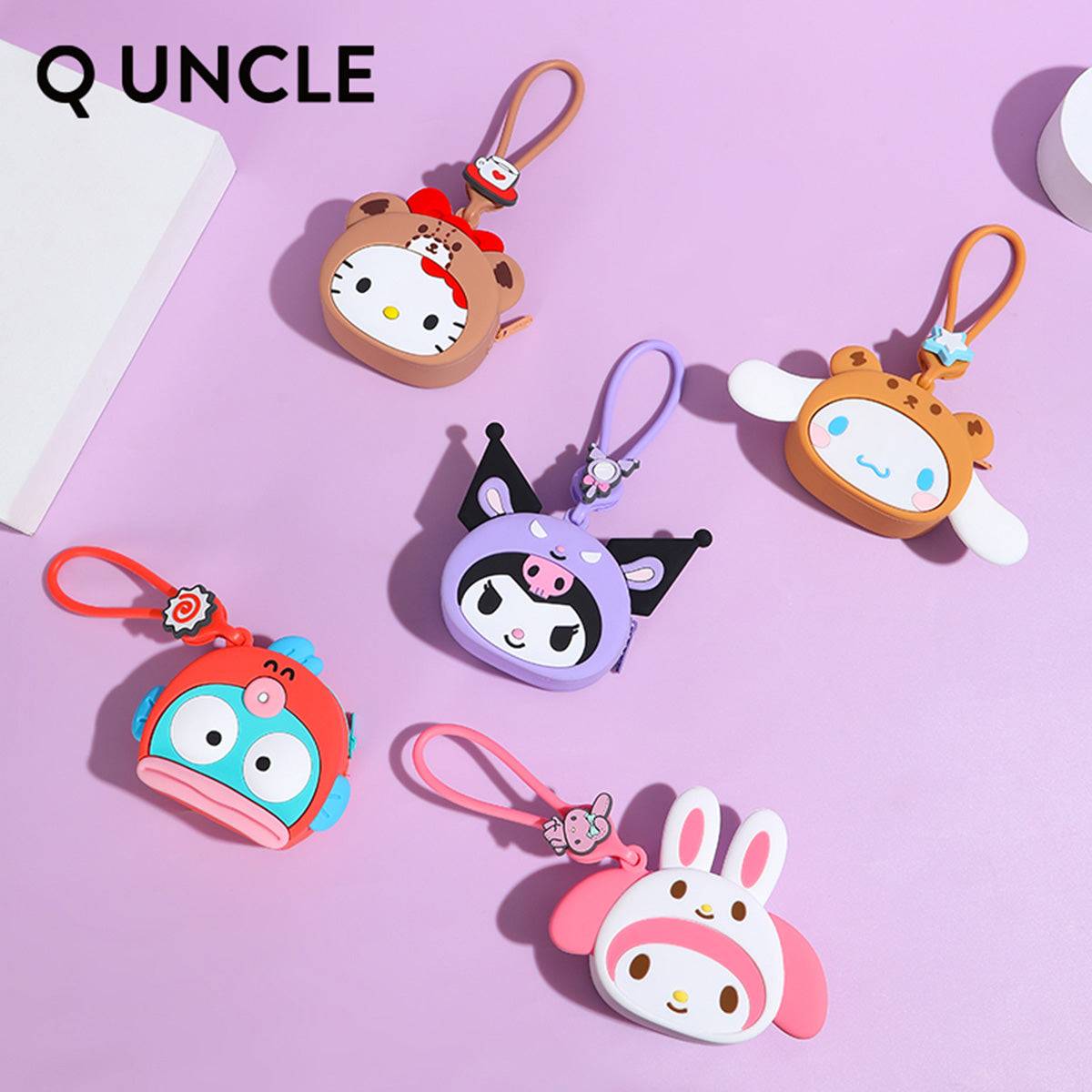 Flat lay of five Sanrio Characters silicone coin purses in various designs, showcasing their vibrant colors and cute details. Perfect for gifting.